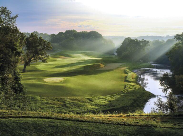 Sunlight cast onto fifth fairway of Blackwolf Run River Course
