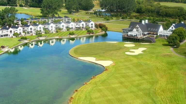 The clubhouse standing behind the eighteenth green