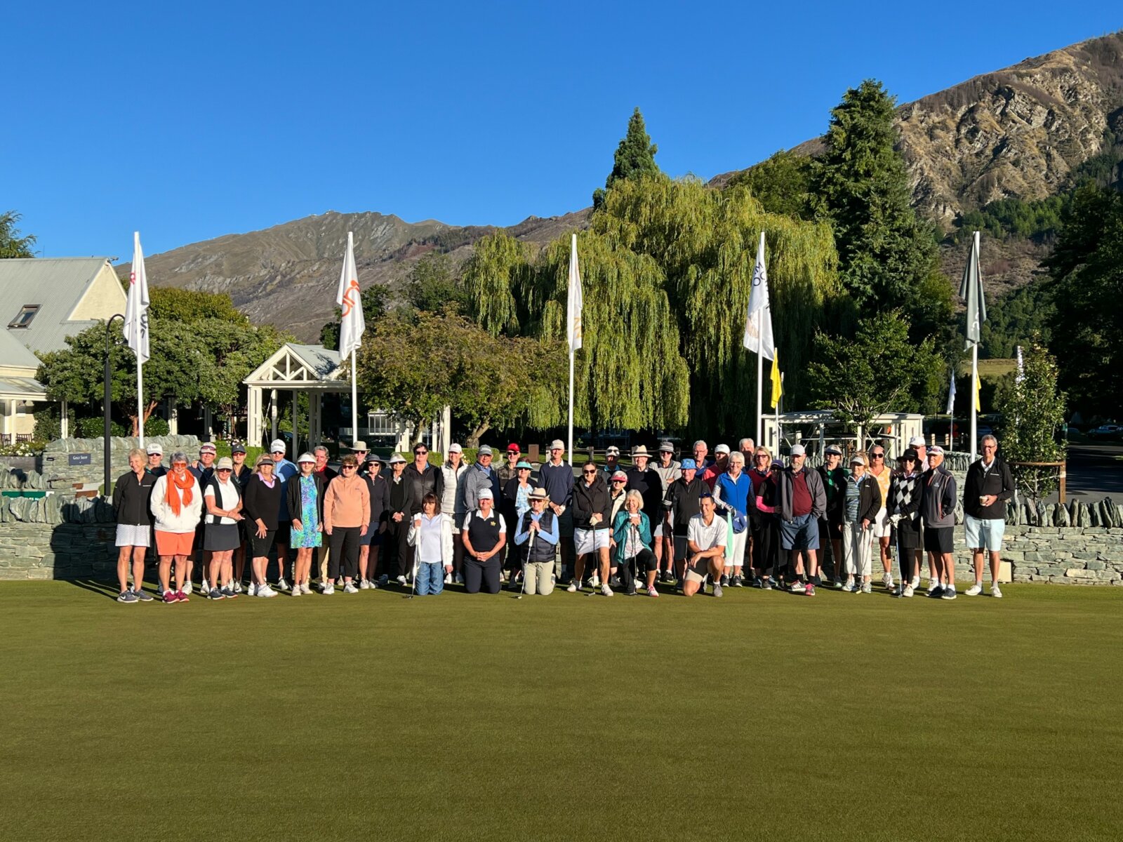 Group of golfers lining up for photo