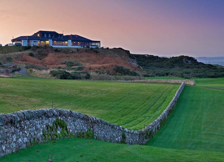 Old stone walls run around the course at craighead, Crail Golfing Society, Fife, Scotland, United Kingdom
