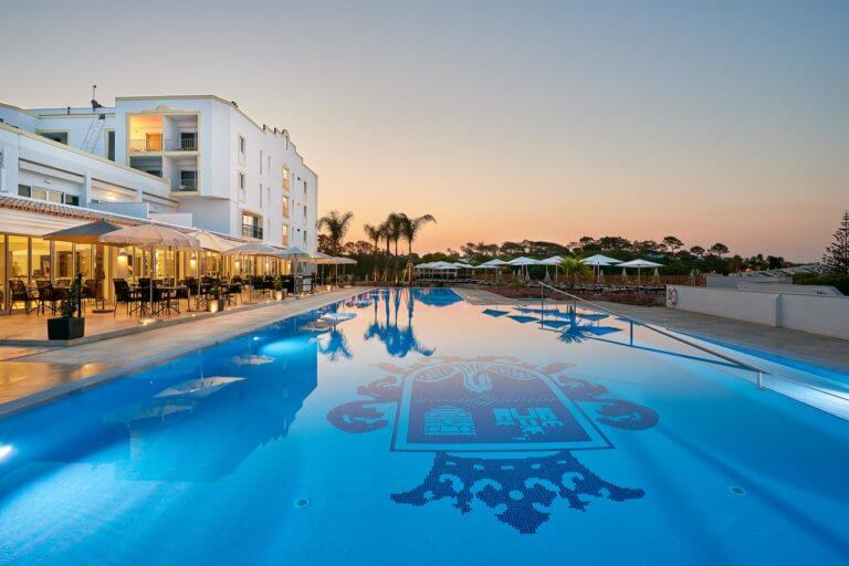 Resort insignia at the bottom of the hotel pool